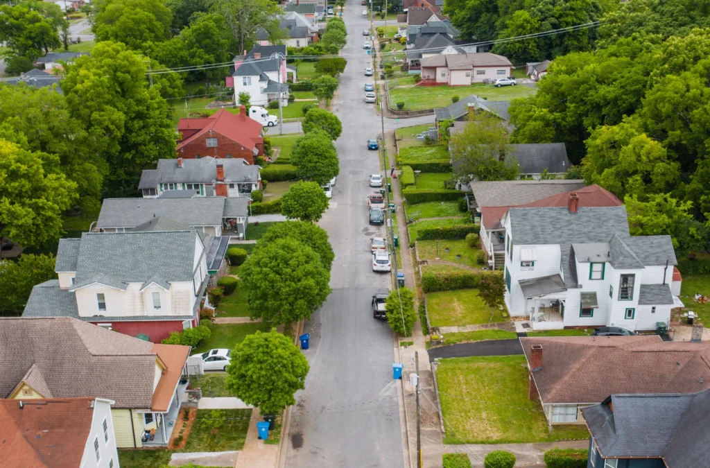 Aerial view of suburban neighborhood street.