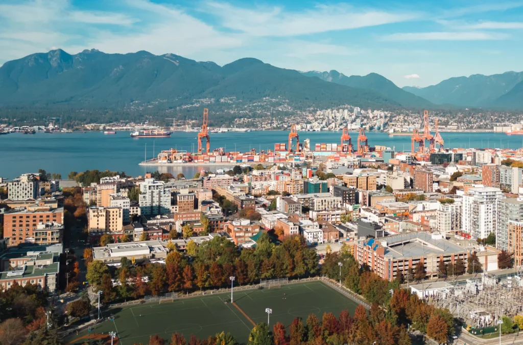 Cityscape with mountains and harbor