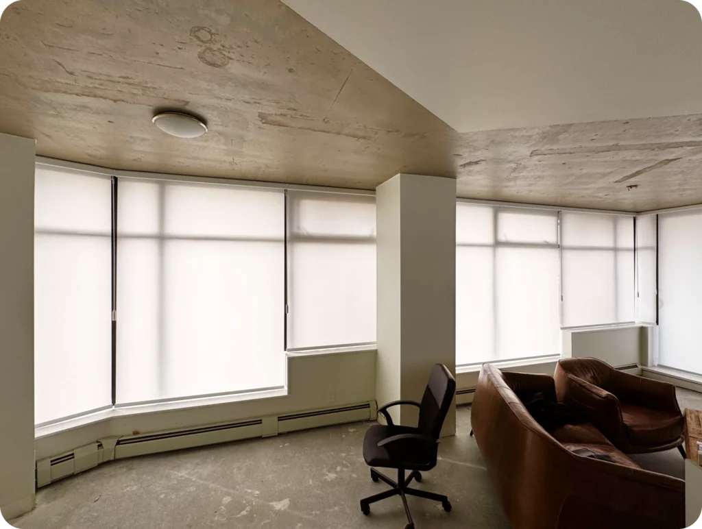 Empty room with large windows