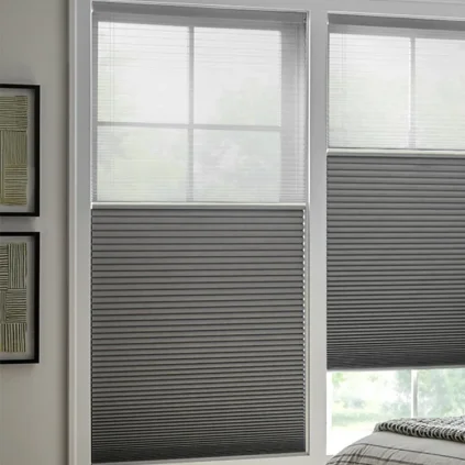 Gray honeycomb window shades closed